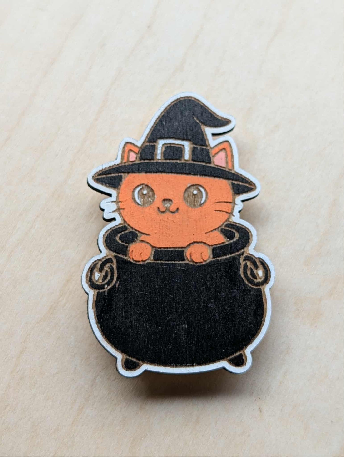 Orange Cat in Cauldron Magnet
