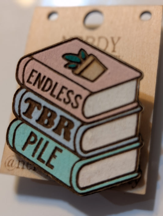 Broche « Pile de livres à lire infinie »