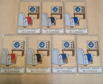 Set of wooden 'Hockey Night in Canada' magnets with regional jersey colours.