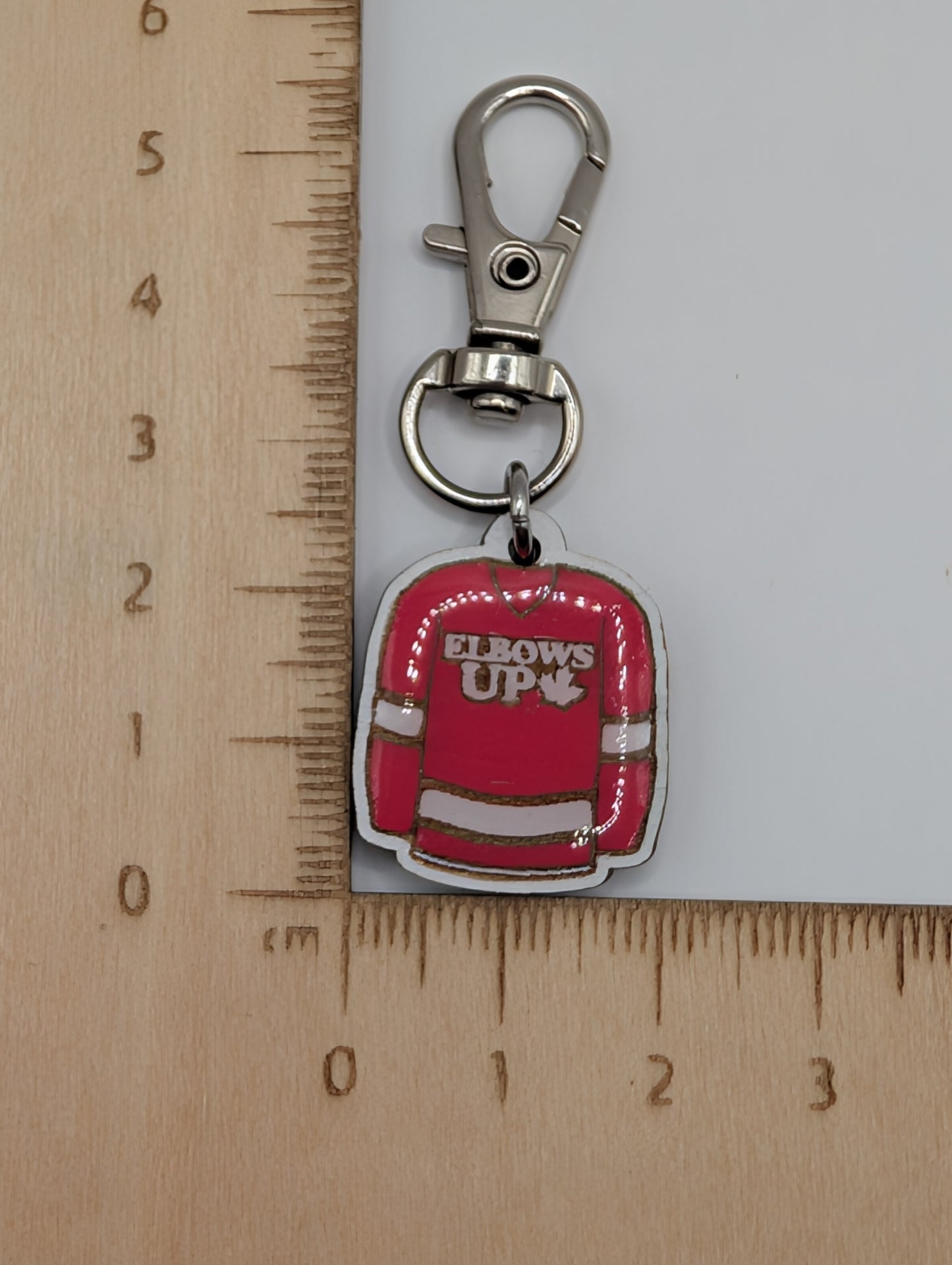 Elbows Up Zipper Pull