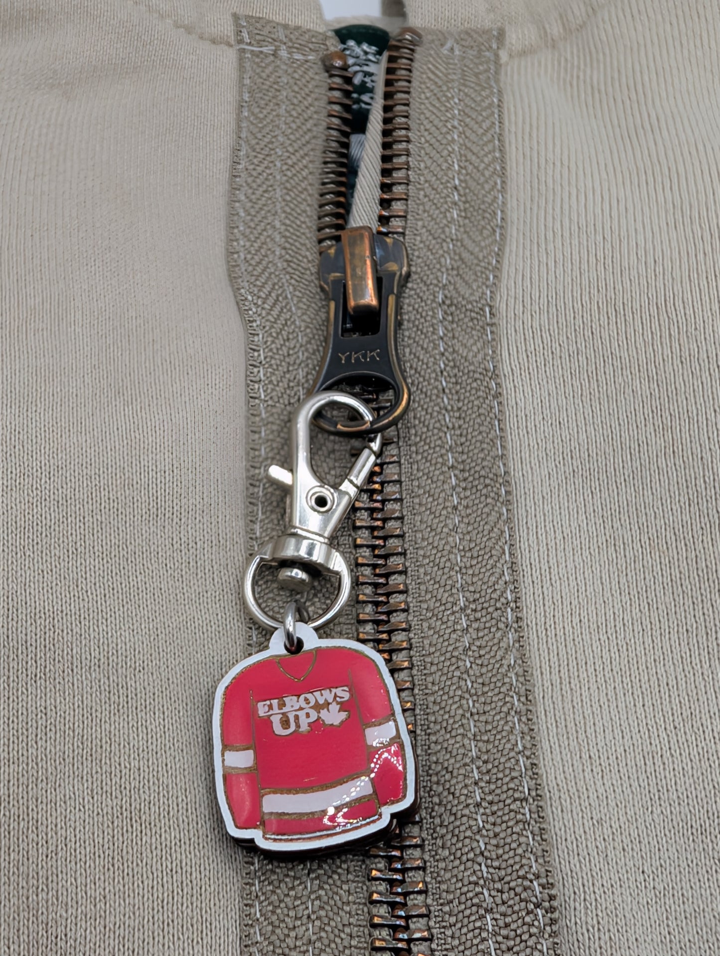 Elbows Up Zipper Pull