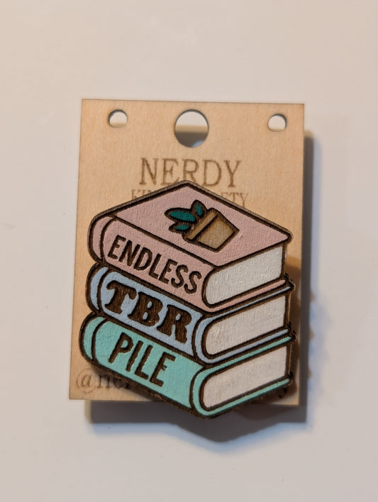 Broche « Pile de livres à lire infinie »