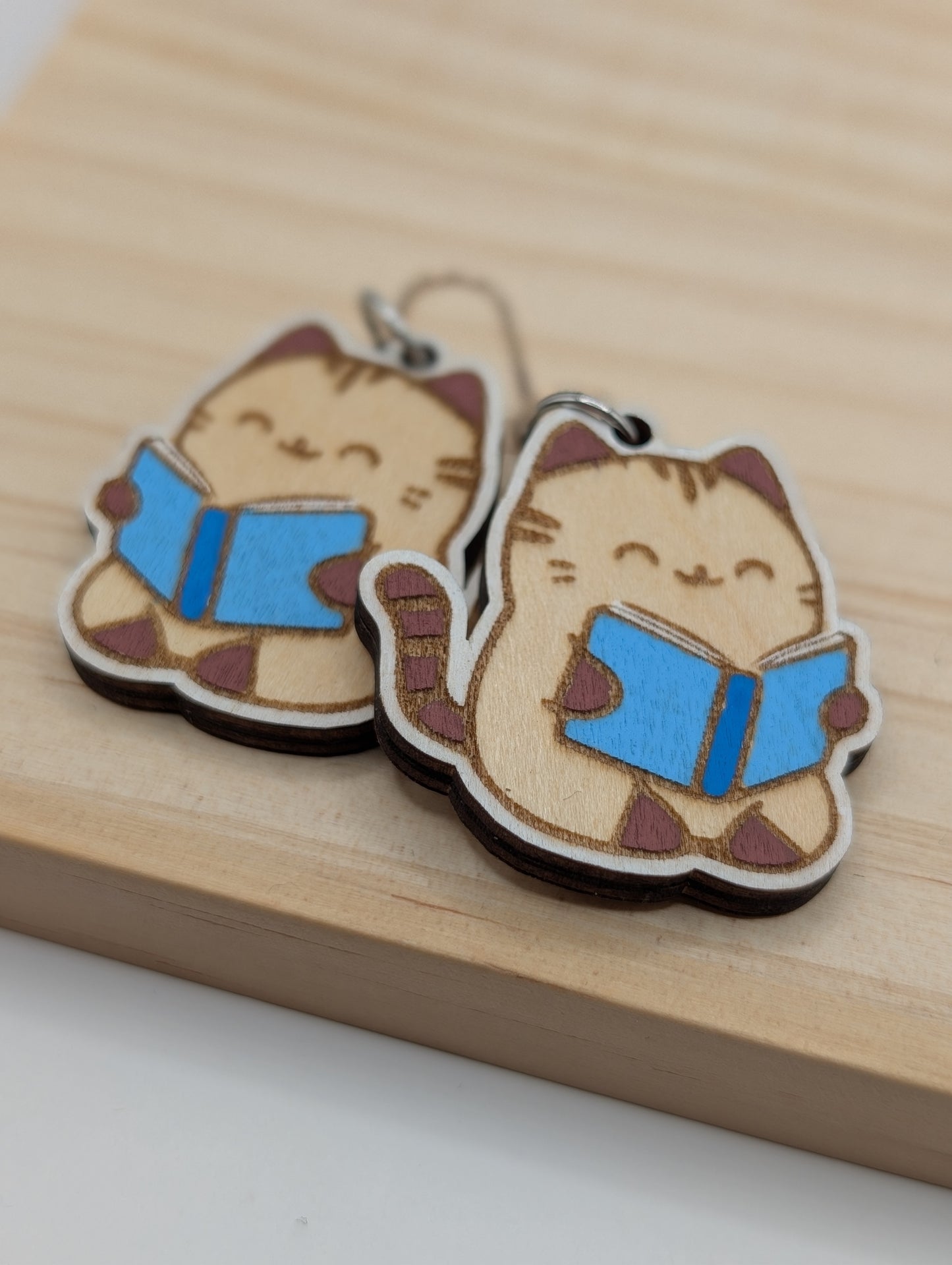Neutral Cat Reading Dangles