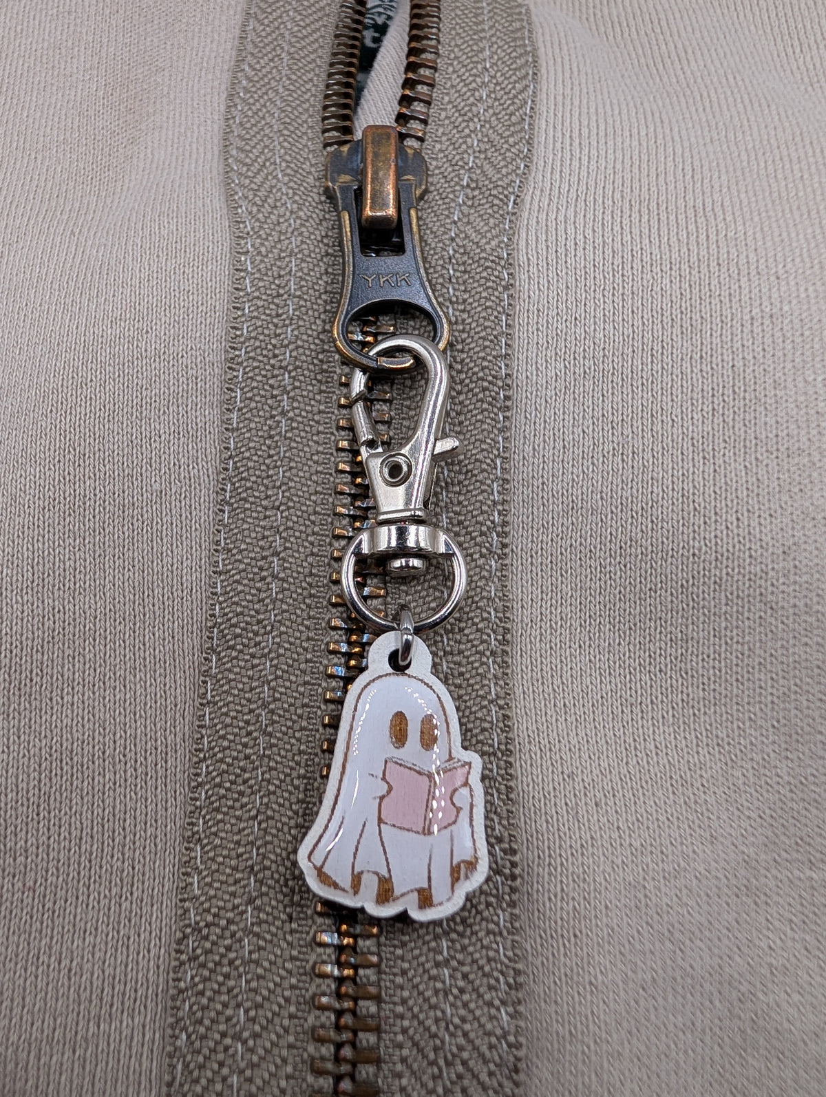 Ghost Reading Zipper Pull