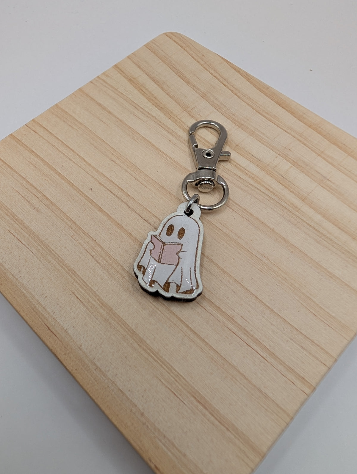 Ghost Reading Zipper Pull